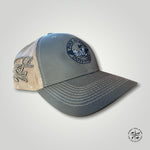 Side view of a grey ball cap with embroidered Pike Island Outfitters logo featuring a loon on the front and embroidered pike fish on the side 